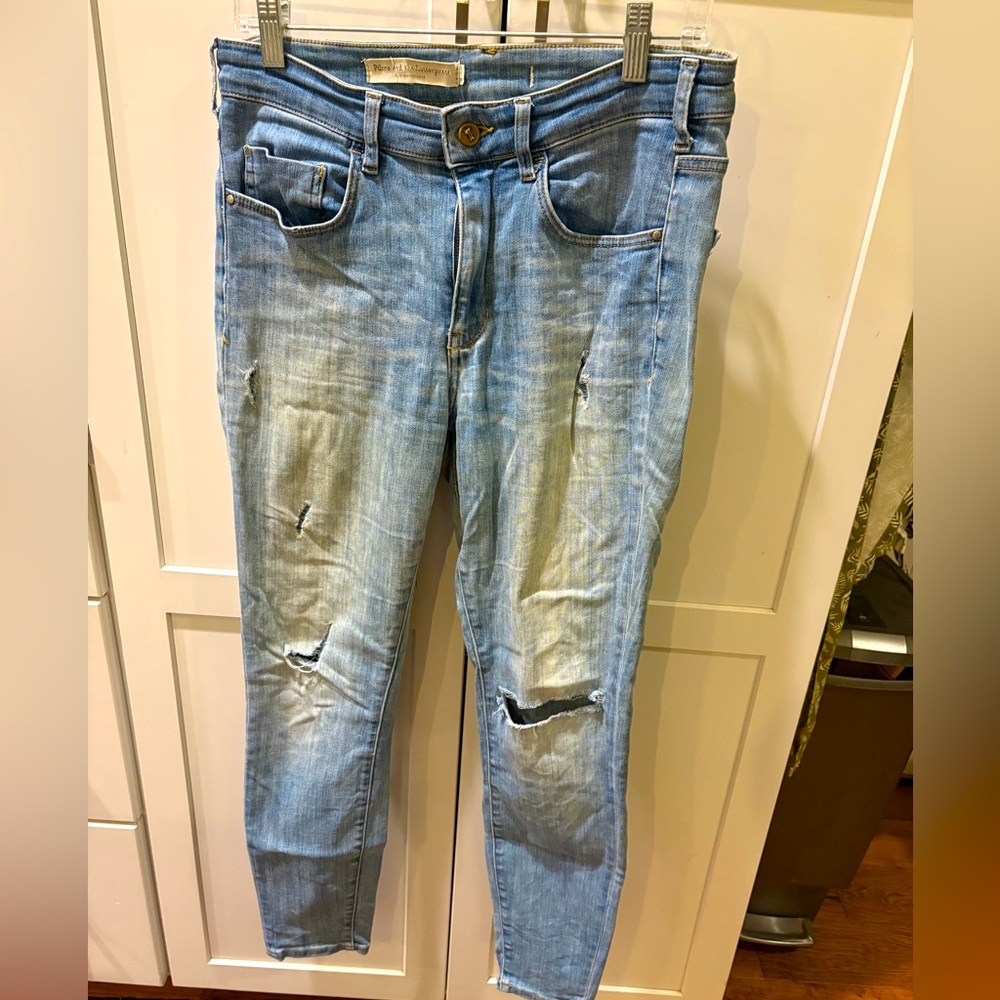 Women's Light Blue Distressed Jeans